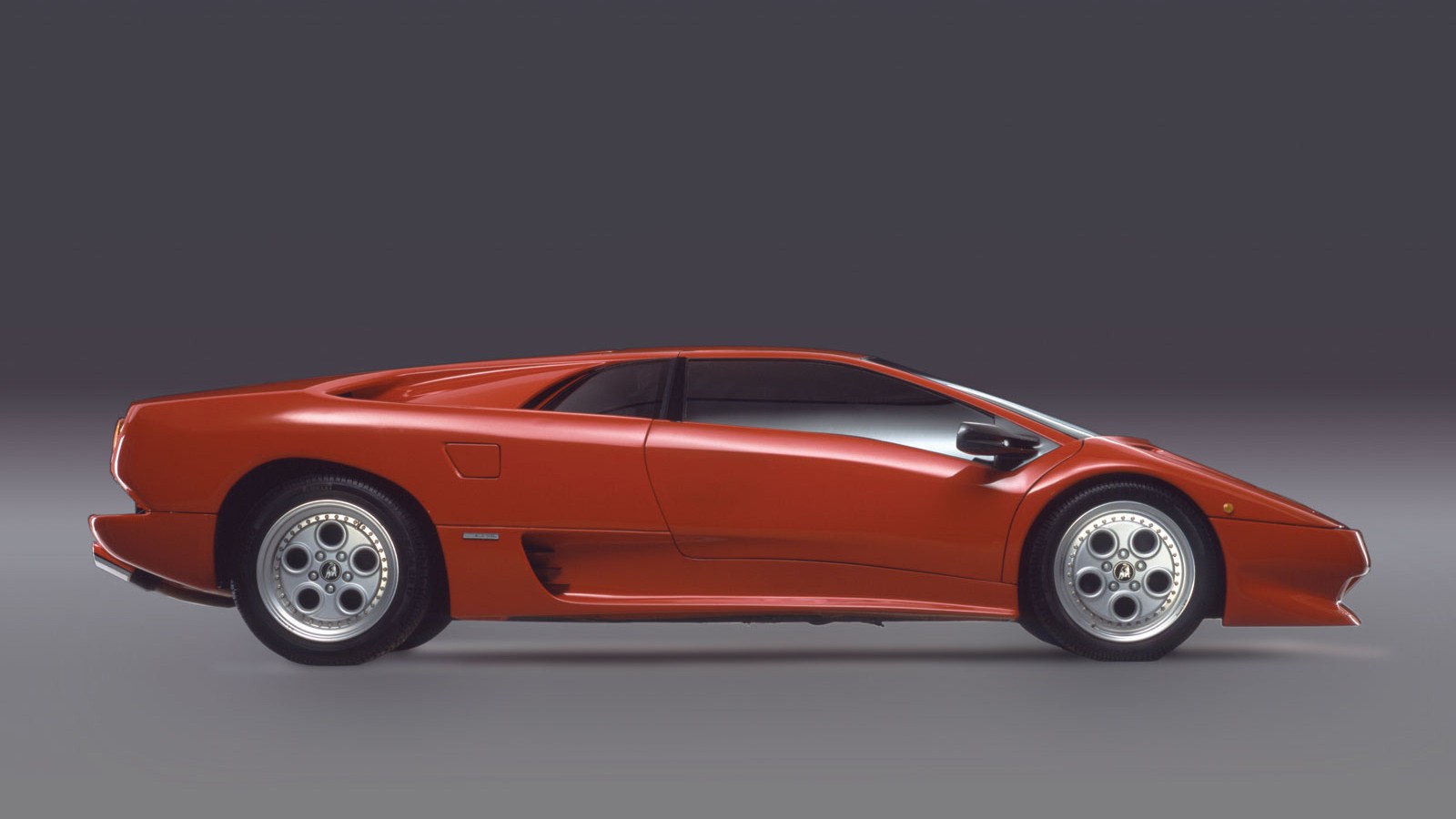 A Red Lamborghini Car on Grey Setting, Combined with ...
