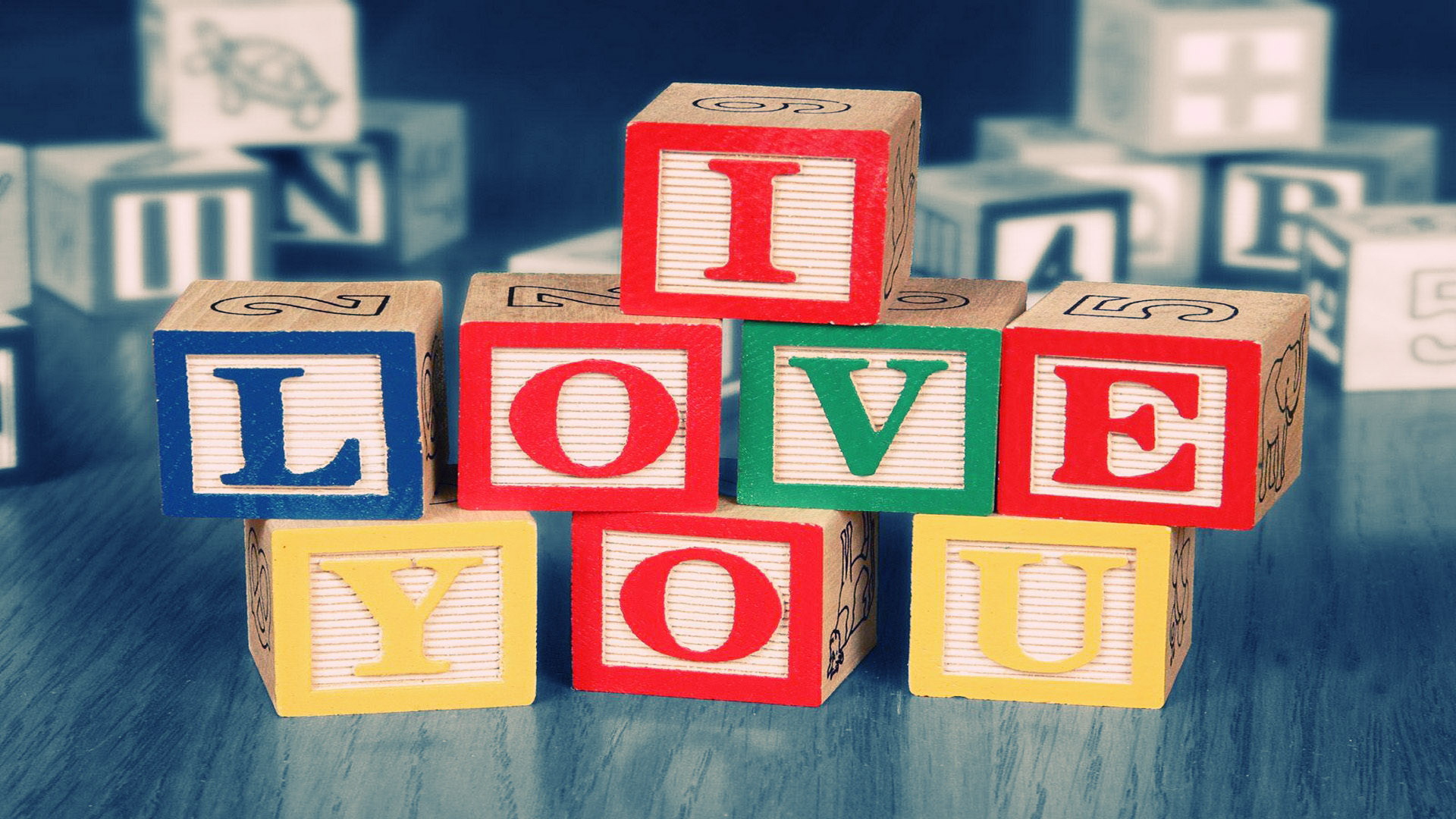 The letters on the square read I LOVE YOU, and they come in various colors,...