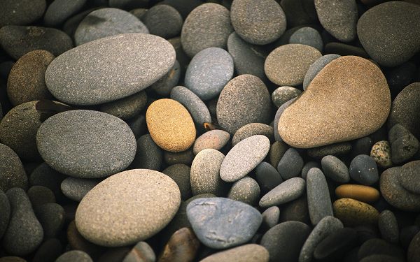 click to free download the wallpaper---A Full Eye of Stones, in Different Sizes and Color, Quite Reminding of Wildness and Freedom - HD Apple Widescreen Wallpaper