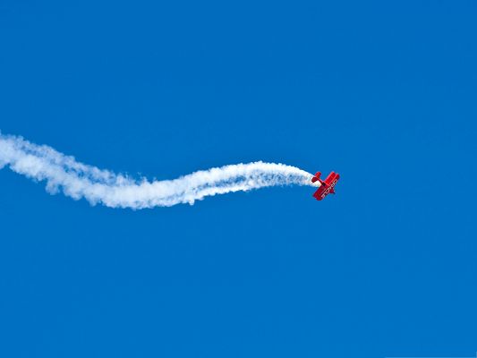click to free download the wallpaper--Air Show Phones, Super Plane Showing Off, White Thick Smoke Behind