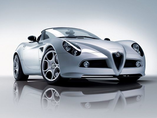 click to free download the wallpaper--Alfa Romeo Spider Car, Silver Car Turning a Corner, Impressive Look