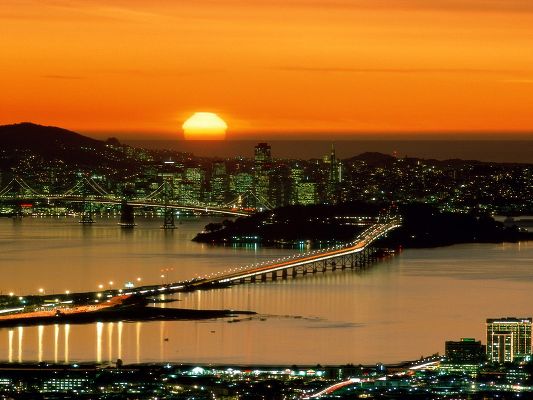 click to free download the wallpaper--Amazing Landscape Image, San Francisco Scene, the Setting Sun, the Bright Bridge, the Peaceful Sea