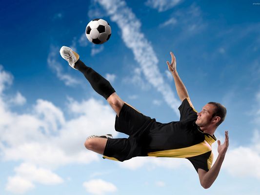 click to free download the wallpaper--Amazing Sports Pic, Kick the Ball in the Air, Make the Shot