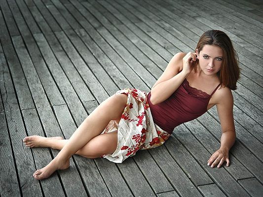 click to free download the wallpaper--Amazing TV Show Image, Beautiful Brunette Lying on Plywood, Appealing Pose