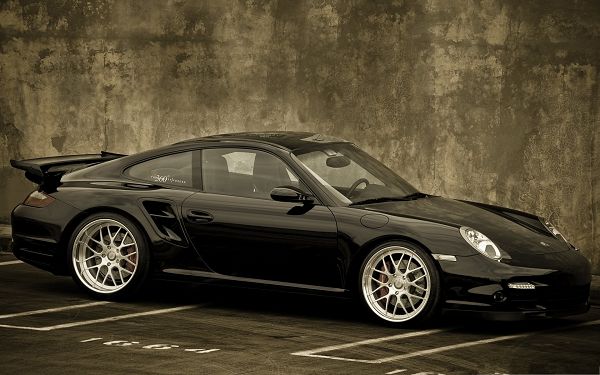 click to free download the wallpaper--Black Porsche Car Wallpaper, Super Car with Smooth Lines, Great Landscape