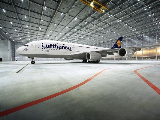 Free Plane Wallpaper, Lufthansa 380 in Open Ground, Under Shinning Lights