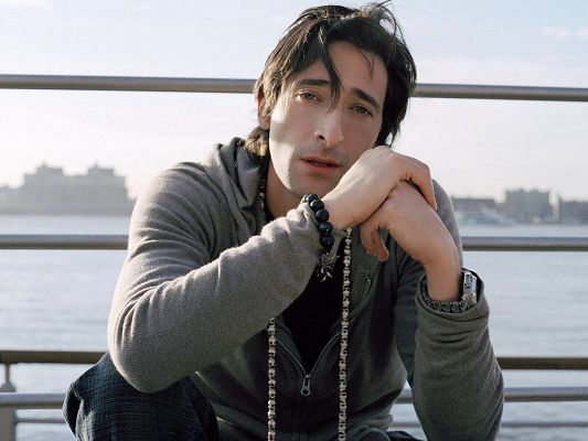 click to free download the wallpaper--Free Post of TV & Movies, Adrien Brody by the Seaside, Gloomy Eyesight and Handsome Face