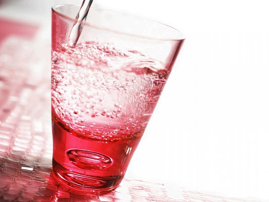 click to free download the wallpaper--Free Water Wallpaper, a Red Glass Of Water, Drink It Up!