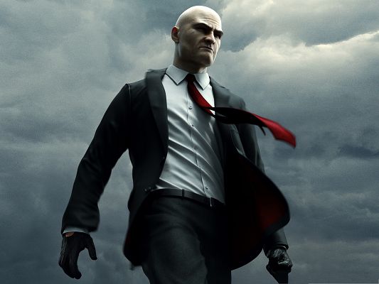 click to free download the wallpaper--Games Widescreen Picture, Hitman in Fast Pace, Walk with Integrity