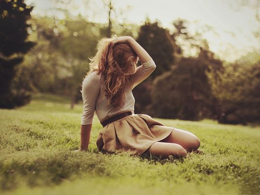 click to free download the wallpaper--Girl Lowering Down, Beautiful Girl Outdoor, Sitting on Green Grass