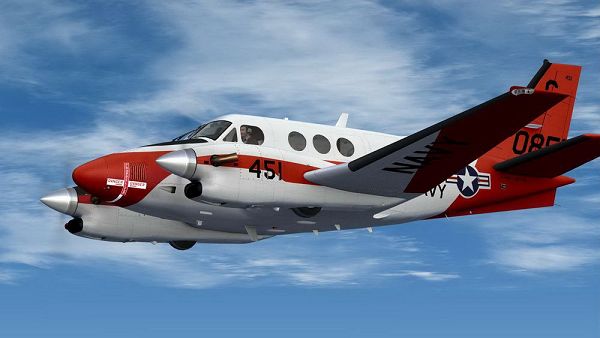 click to free download the wallpaper--Images of Air Show Paris, US Navy Beechcraft T-44A in flight, Free Fly