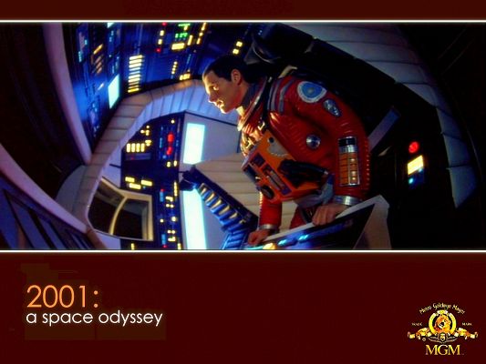 click to free download the wallpaper--Inside the Aeroplane - 2001 A Space Adyssey, the Handsome and Well-Equipped Pilot in Cabin