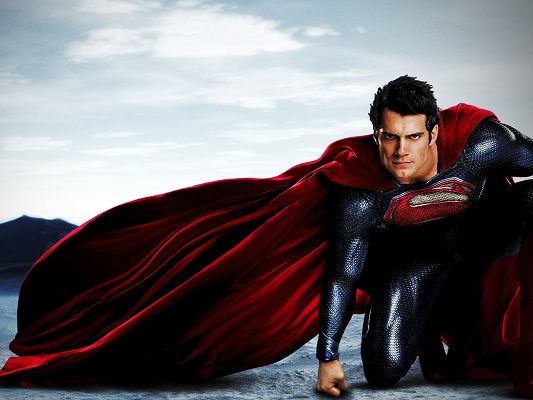 click to free download the wallpaper--Man Wallpaper, DC Comics Man of Stell, Red Cloak, Strong and Muscular
