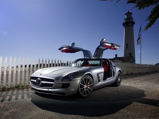 click to free download the wallpaper--Mercedes Benz Car Wallpaper, Gray Car with Wide Open Doors, Fences Around