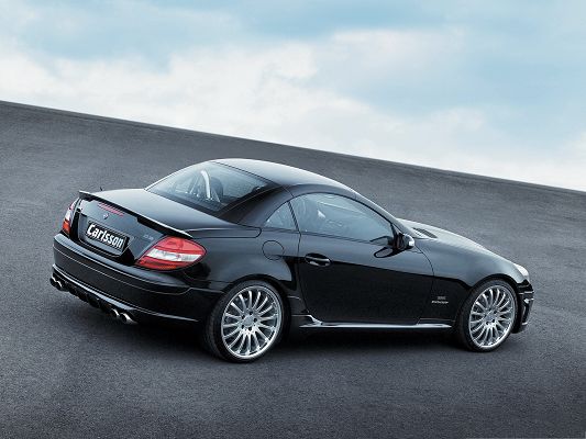 click to free download the wallpaper--Mercedes Benz SLK 350, Black Super Car Running Down a Slope, Amazing Look