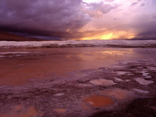 click to free download the wallpaper--Nature Landscape Image, Storm Over Lagoon, the Setting Sun, Romantic Scene