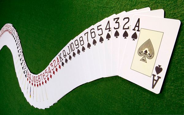 click to free download the wallpaper--Playing Cards Wallpaper, Let's Sit and Play Cards on the Green Grass