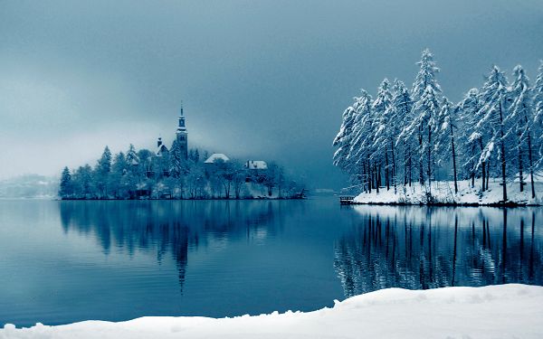 click to free download the wallpaper--Sleeping Sea and Thick Snow Covered Trees and Buildings, Won't be Long before the Sun Shows up - HD Natural Scenery Wallpaper