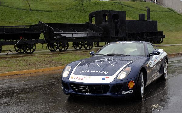 click to free download the wallpaper--Top Brand Cars, Blue Ferrari Sport Car in Heavy Rain, Be Careful with Driving