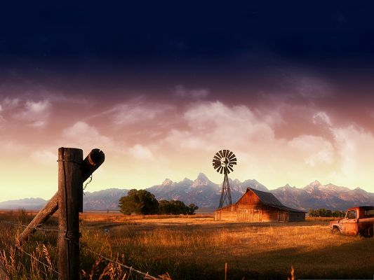 click to free download the wallpaper--Wallpaper for the Computer - Farmland Under the Dark Sky