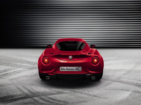 click to free download the wallpaper--World-Known Cars Image of Alfa Romeo 4C, Seen from the Static Rear, Red Car in Front of Garage