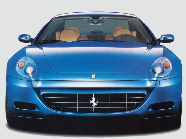 free wallpaper: a blue Ferrari is coming ,click to download