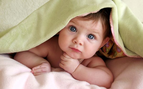 free wallpaper of baby-a curious baby staring at something,click to download