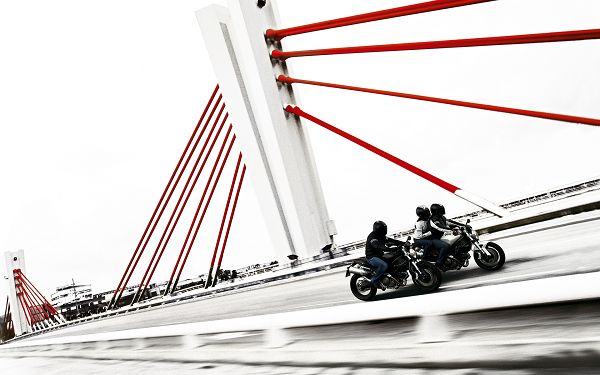 free wallpaper: the Ducati Motorbike running on the highway ,click to download