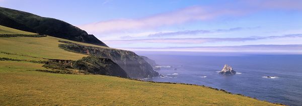 click to free download the wallpaper--natural scene photos - Both the Sky and the Sea Incredibly Blue, a Large Green Field on the Side 